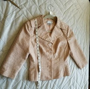 A 2 piece suit with a bottom skirt